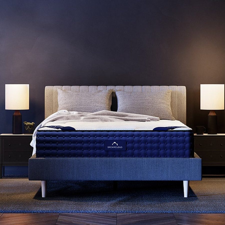 DreamCloud Classic Hybrid mattress on a bed frame, the top pick in this guide